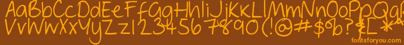 フォントDjbGeordieGirl – オレンジ色の文字が茶色の背景にあります。