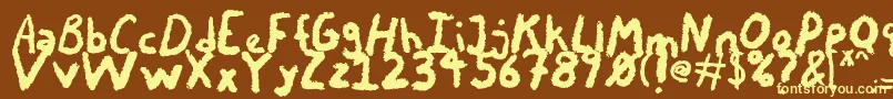 Шрифт ChalkyChicken – жёлтые шрифты на коричневом фоне