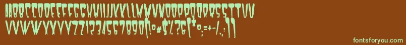 フォントSatan1981 – 緑色の文字が茶色の背景にあります。