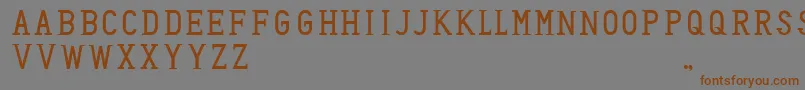 HoneyBadger Font – Brown Fonts on Gray Background