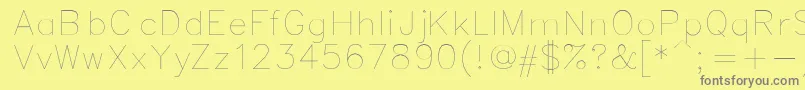 Simplex-fontti – harmaat kirjasimet keltaisella taustalla