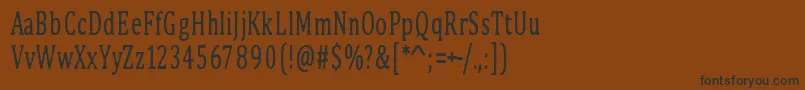 フォントPinkBunny2 – 黒い文字が茶色の背景にあります