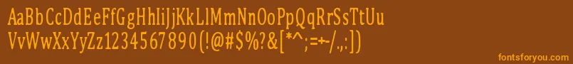 フォントPinkBunny2 – オレンジ色の文字が茶色の背景にあります。