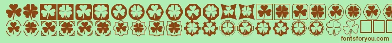 Cloverthings Font – Brown Fonts on Green Background