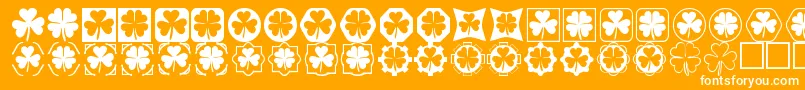Czcionka Cloverthings – białe czcionki na pomarańczowym tle