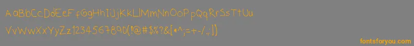 フォントSHand – オレンジの文字は灰色の背景にあります。