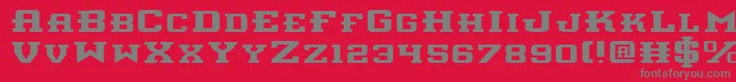 フォントInterceptorExpanded – 赤い背景に灰色の文字