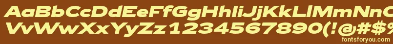 Zeppelin43BoldItalic-fontti – keltaiset fontit ruskealla taustalla