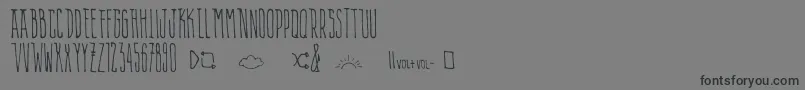 AlienPlaylist-Schriftart – Schwarze Schriften auf grauem Hintergrund