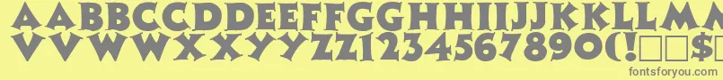 ZinniaRegular-fontti – harmaat kirjasimet keltaisella taustalla