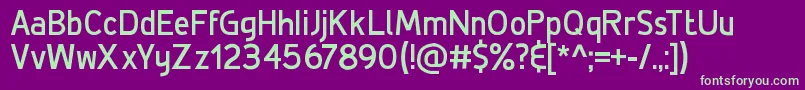 DeLuxeBold Font – Green Fonts on Purple Background
