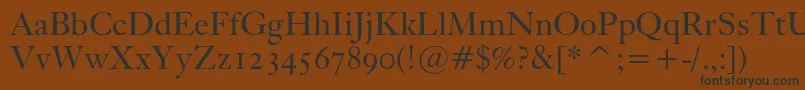 Kisoscbt Font – Black Fonts on Brown Background