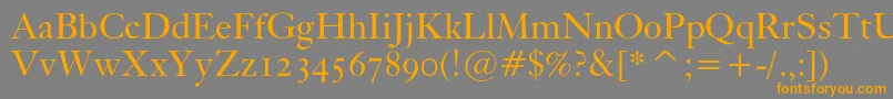 Kisoscbt-Schriftart – Orangefarbene Schriften auf grauem Hintergrund