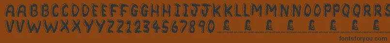 Bedrock Font – Black Fonts on Brown Background