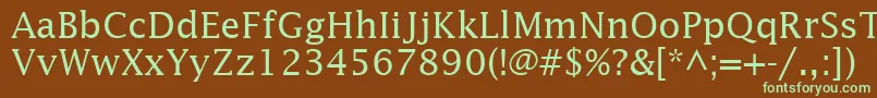 フォントInsightSsi – 緑色の文字が茶色の背景にあります。