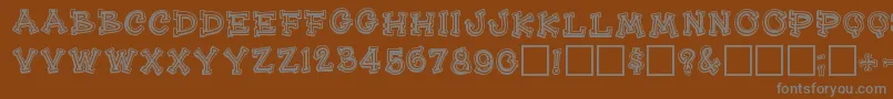 Heehawregular-fontti – harmaat kirjasimet ruskealla taustalla