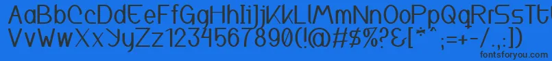 Inspyratta Font – Black Fonts on Blue Background