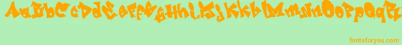 GrafitiJedagraphicx-Schriftart – Orangefarbene Schriften auf grünem Hintergrund