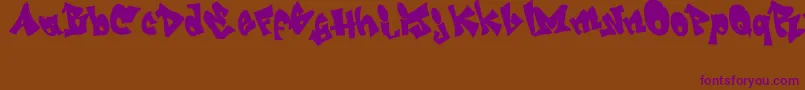 GrafitiJedagraphicx Font – Purple Fonts on Brown Background