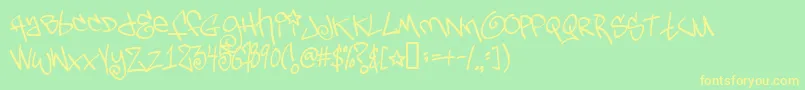 Tagsx Font – Yellow Fonts on Green Background