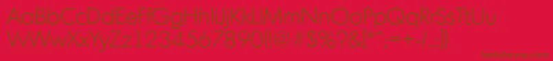 MontrealserialLightRegular-Schriftart – Braune Schriften auf rotem Hintergrund