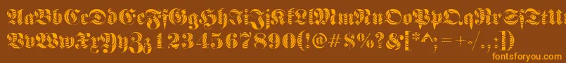 FrakturwindingRegular-Schriftart – Orangefarbene Schriften auf braunem Hintergrund