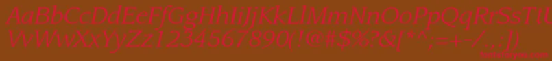 フォントLeawoodstdBookitalic – 赤い文字が茶色の背景にあります。