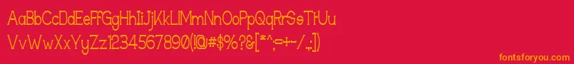 フォントTechingm – 赤い背景にオレンジの文字