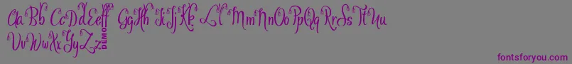 Czcionka OfalyDemo – fioletowe czcionki na szarym tle