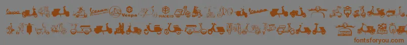 フォントVespa – 茶色の文字が灰色の背景にあります。