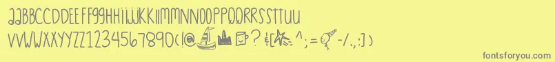 フォントExpressocaffe – 黄色の背景に灰色の文字