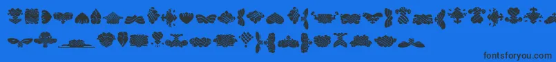 BlackOrnamentsFree-Schriftart – Schwarze Schriften auf blauem Hintergrund