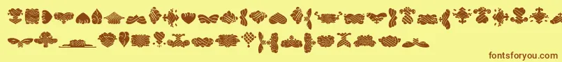 BlackOrnamentsFree Font – Brown Fonts on Yellow Background