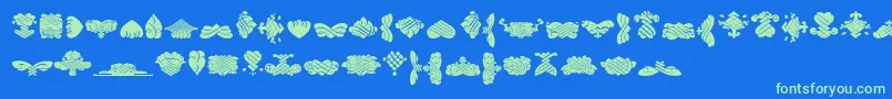 BlackOrnamentsFree-Schriftart – Grüne Schriften auf blauem Hintergrund