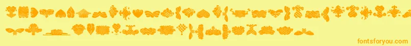 BlackOrnamentsFree-Schriftart – Orangefarbene Schriften auf gelbem Hintergrund