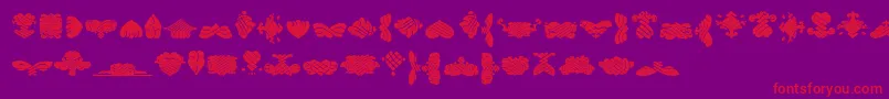 Шрифт BlackOrnamentsFree – красные шрифты на фиолетовом фоне