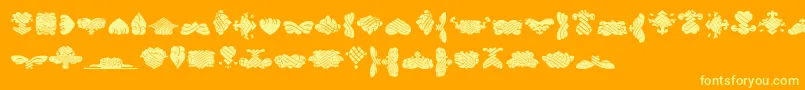 Czcionka BlackOrnamentsFree – żółte czcionki na pomarańczowym tle