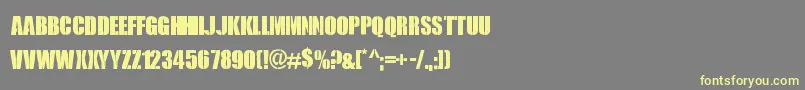 RoyalRumble Font – Yellow Fonts on Gray Background