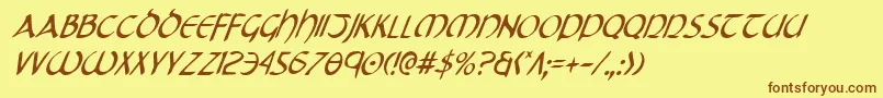 フォントTristramci – 茶色の文字が黄色の背景にあります。