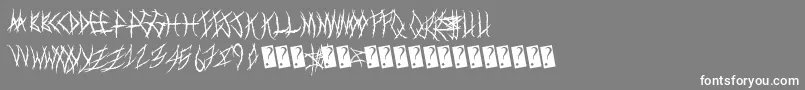 フォントMetalshow – 灰色の背景に白い文字