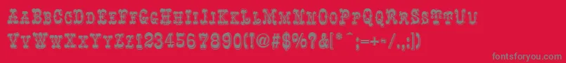 フォントRochesterLine – 赤い背景に灰色の文字