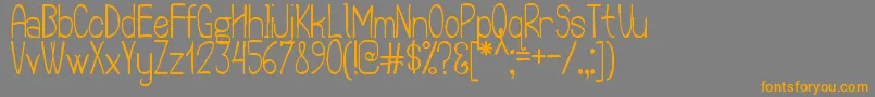 TheQuickFrogPersonalUse Font – Orange Fonts on Gray Background