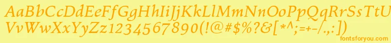 フォントKelvinchItalic – オレンジの文字が黄色の背景にあります。