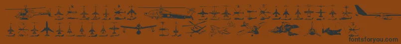 Czcionka Aircraft – czarne czcionki na brązowym tle