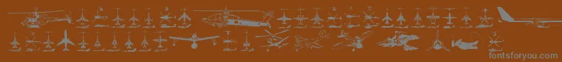 Aircraft-Schriftart – Graue Schriften auf braunem Hintergrund