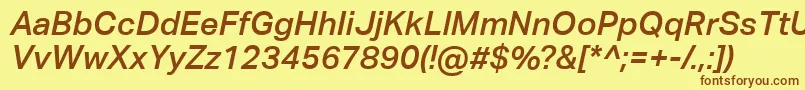 AktivgroteskcorpMediumitalic-fontti – ruskeat fontit keltaisella taustalla