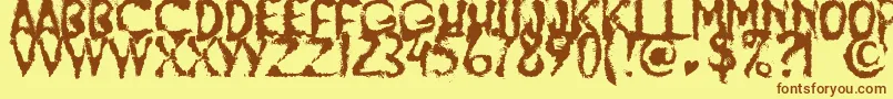 フォントJumpBurnIp2012 – 茶色の文字が黄色の背景にあります。
