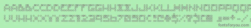 ConNinguna-fontti – harmaat kirjasimet vihreällä taustalla