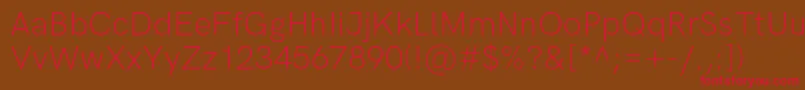 HkgroteskLight Font – Red Fonts on Brown Background