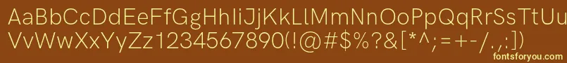 HkgroteskLight Font – Yellow Fonts on Brown Background